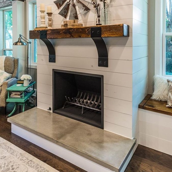 White tile and stone fireplace