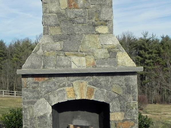 Outdoor thin stone veneer fireplace
