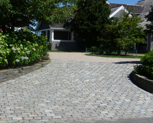 Granite stone driveway in front of a house