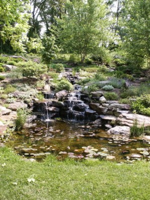 Landscaping rocks used in an backyard waterfall water feature