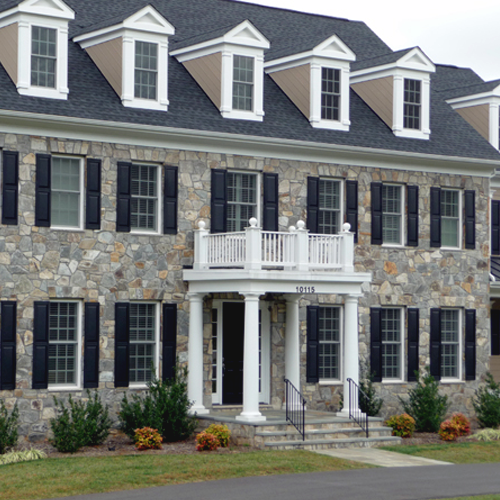 Multi-colored stone colonial building