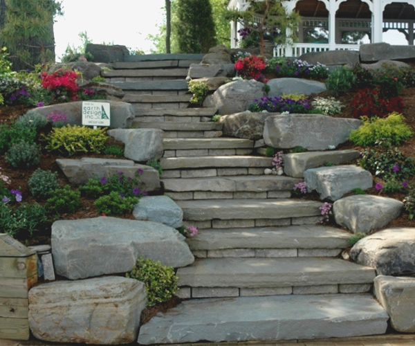 Stone steps with mulch and flowers