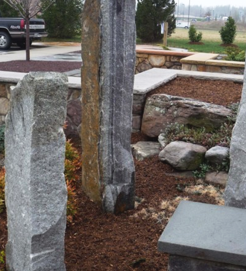 Red mulch and boulders